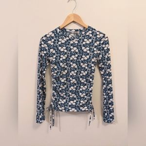 Good Luck Gem long sleeved, rouched side top with side pull ties.